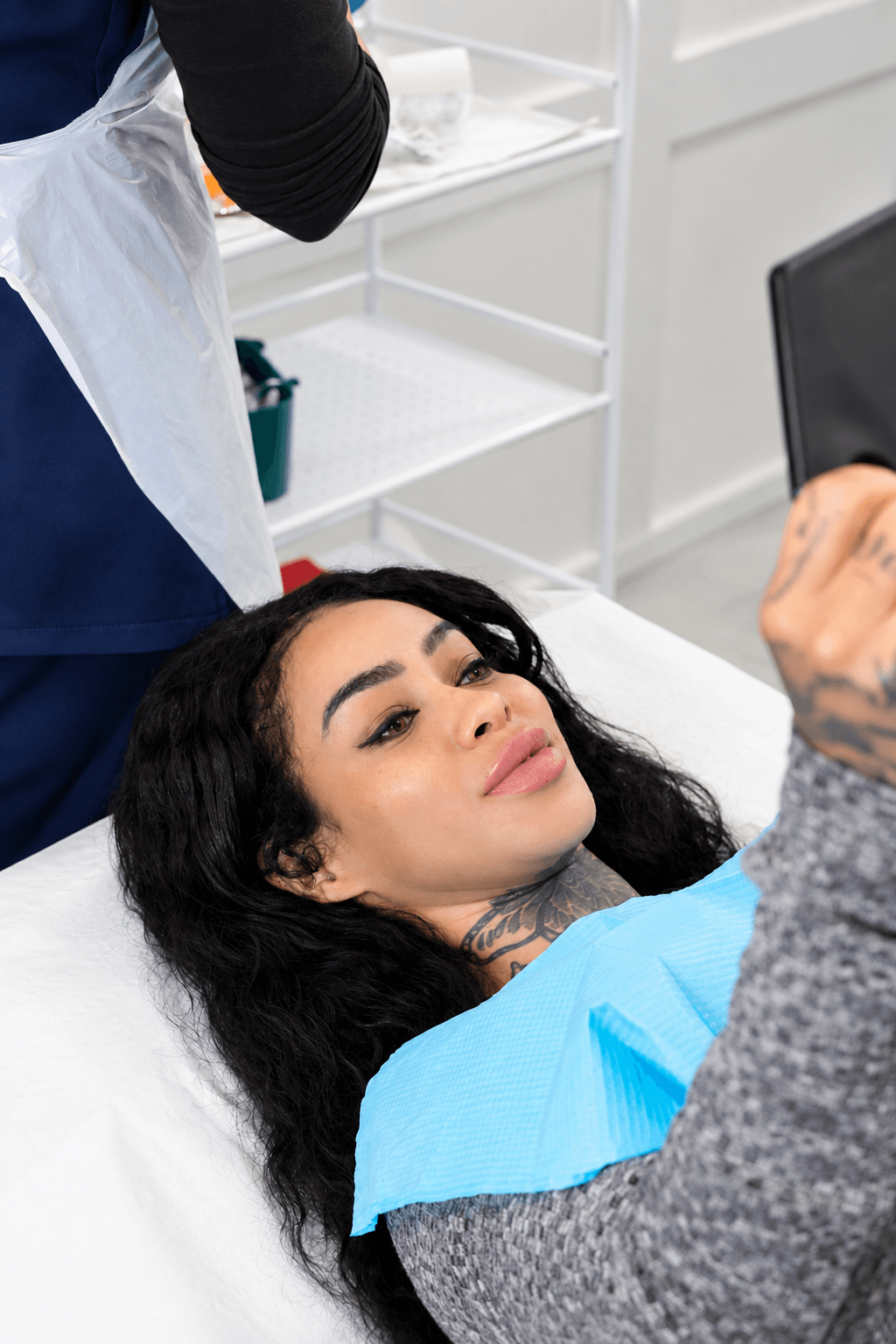 non-surgical-rhinoplasty-consultation Client reclining during a non-surgical rhinoplasty consultation at Jazz Beauty Clinic